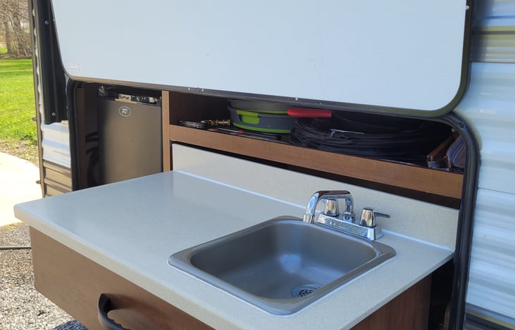 Outdoor sink & small refrigerator