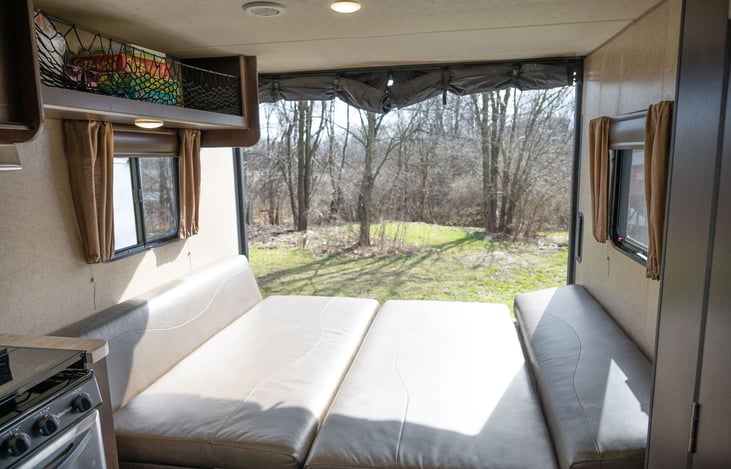 Wide Open Spaces!  Standing in the main area of camper in front of kitchen.  Ramp down