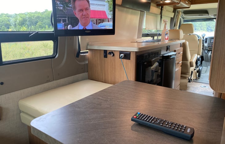 The moveable table allows for a relaxing area in the back of the cabin of the Sprinter
