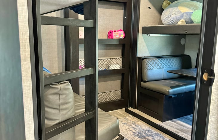 The kid’s bunk house! Dinette turns into a bunk.