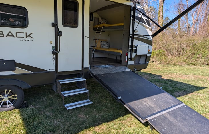 Large ramp makes it easy to load all your gear. Versatile garage with bunk beds that flip up for added storage space.