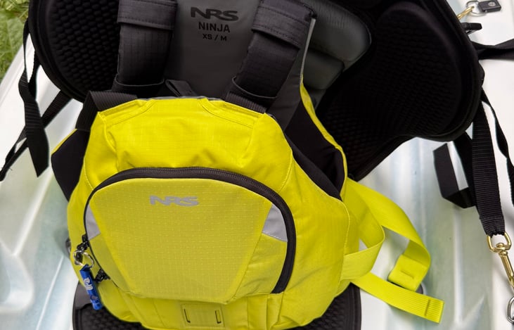 S/M NRS Ninja PFD with hand warmer pockets.