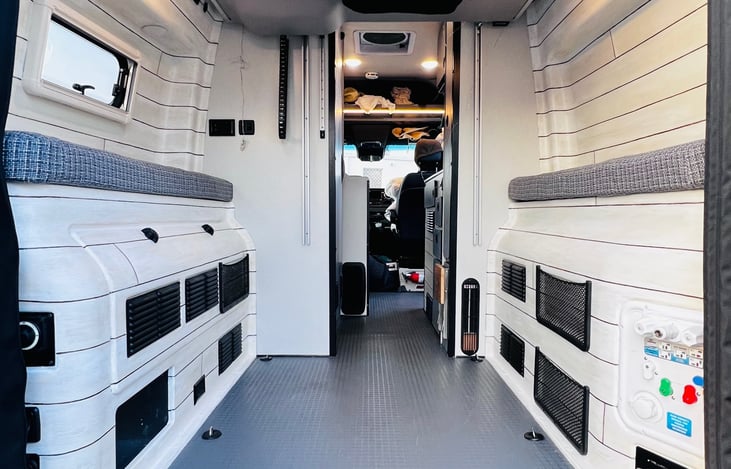 You can raise the bed with a push of a button all the way into the ceiling when it’s not in use.  This allows you to load the garage, and always have the bed made.