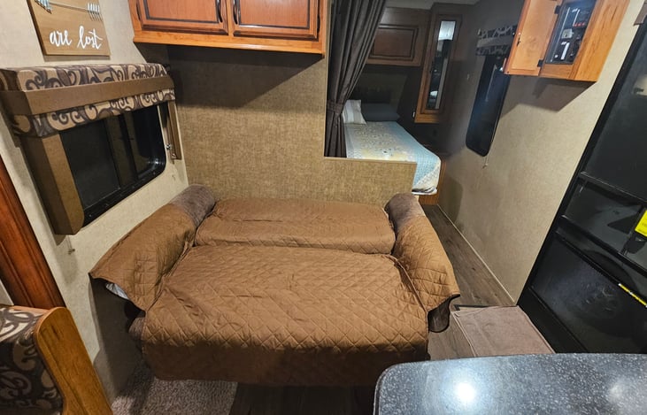 Jack knife sofa folded into bed for one adalt or two kids