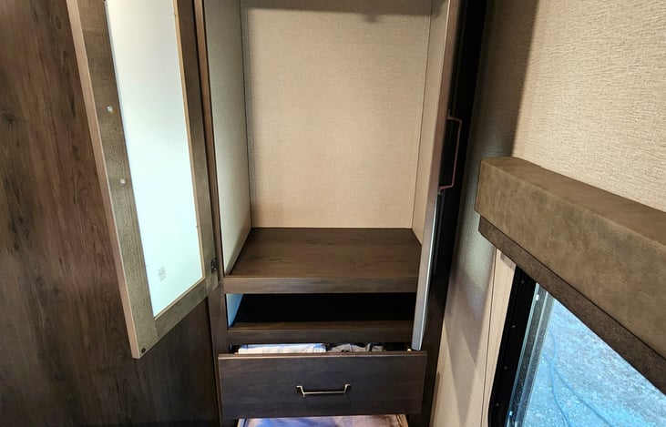 Hanger rod and drawers in the master bedroom.