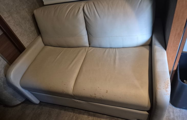 The right side has some fraying in the leather but is still a comfy place to sit.