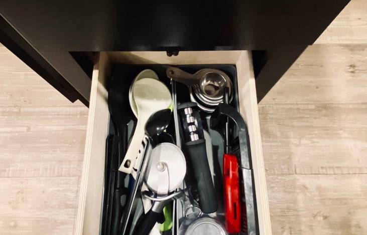 Drawer 2: Stocked with a pizza cutter, measuring cups, knife sharpener, and all the nick-nacks you can possibly need!