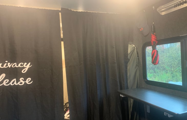 Privacy curtains to sleeping area