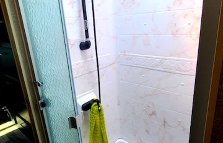 Working shower with removable head and hot water