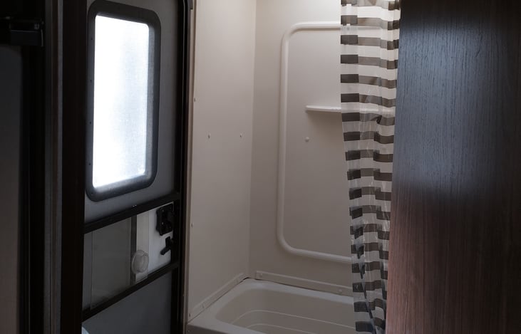 Bathroom with shower and tub