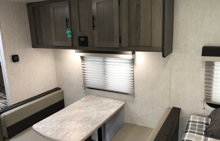 Sitting area (Doubles as a bed) with storage cabinets