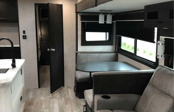 Open floorplan kitchen and dinette area. The dinette converts to a bed as well.