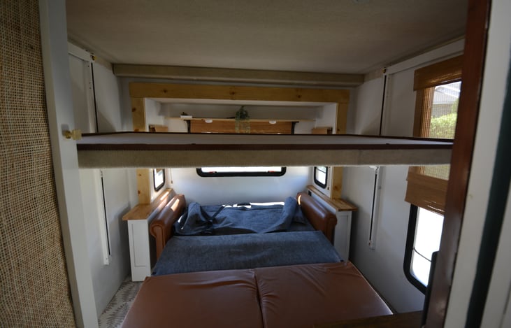 We will provide an air mattress that goes over the couch bed and top bunk.