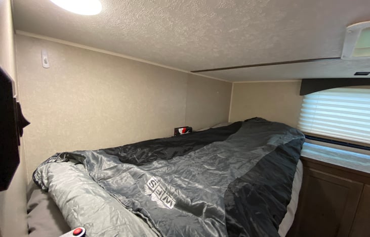 Bunkhouse: upper left bunk with button light