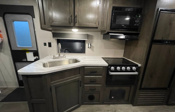 Equipped for adventure, this kitchen is your passport to delicious meals in the great outdoors.