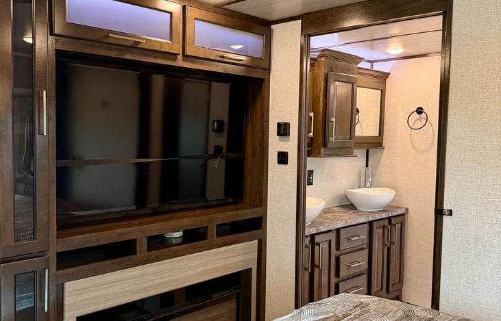 Resort-Style Bath: High-end dual-sink vanity with vessel bowls so two people can easily get ready at the same time.