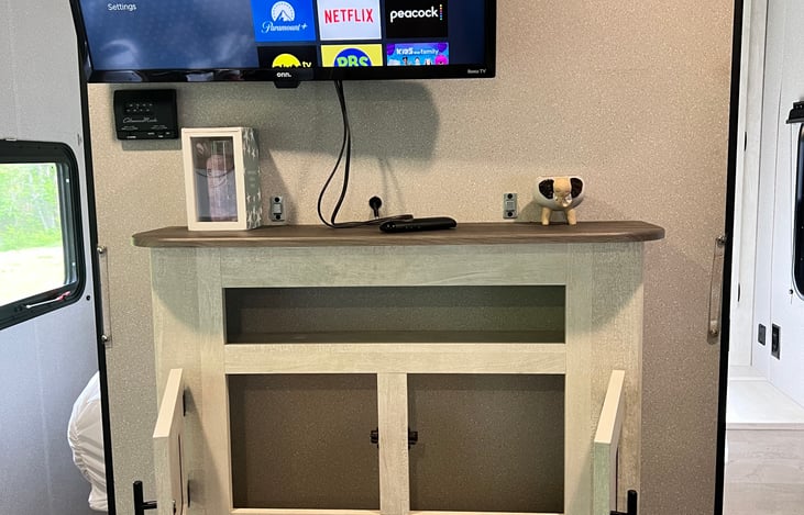 TV with mantle + storage