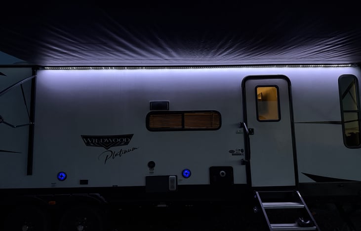 LED lights under the awning and Bluetooth speakers.