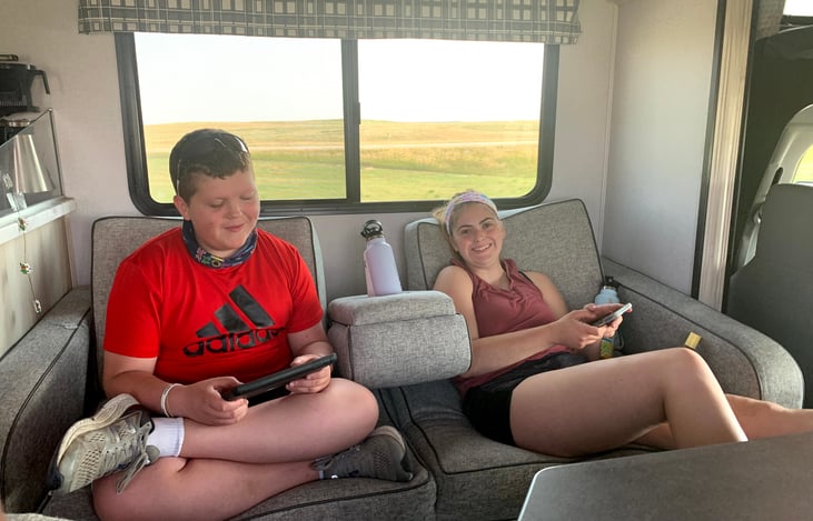 Our family rule is 20 minutes on 40 minutes off electronics. The kids love the RV. Moreso the trip most of the time!