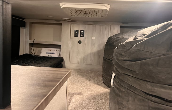 Loft area with mattresses and beanbag chairs. Loft sleeps three.