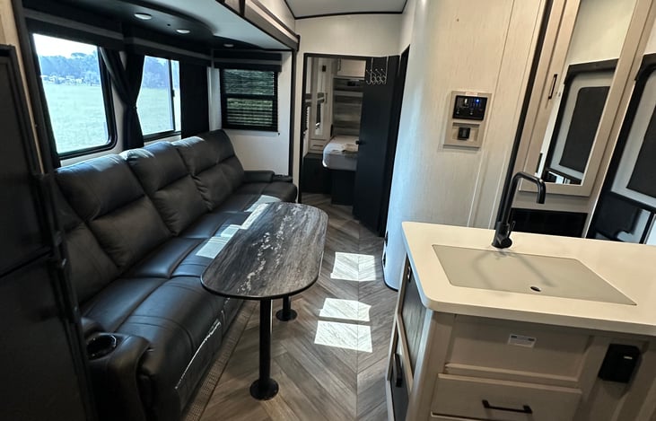 The table is removable for more floor space.