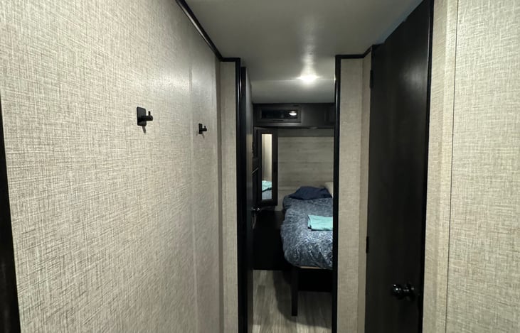 Hallway to master bedroom and bathroom