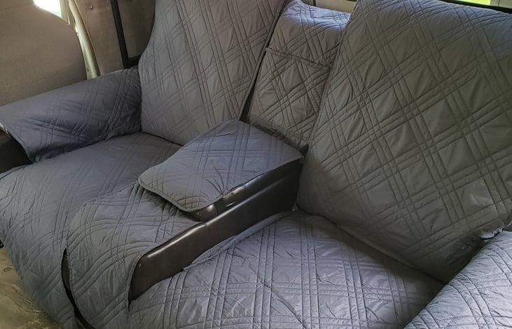 Lap trays are provided in the cabinet above to enjoy your meals in the recliners.