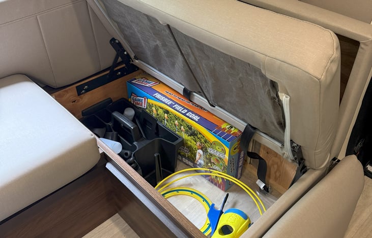 outdoor games & grill accessories under right dinette seat