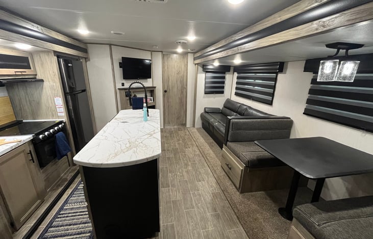 Living room/kitchen area.