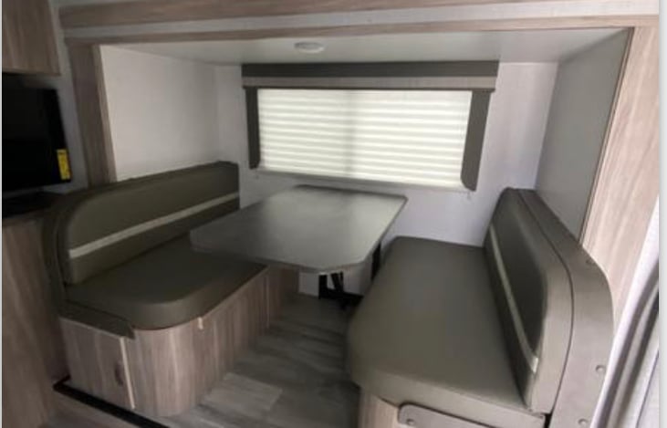 Dining table; converts to full size bed.