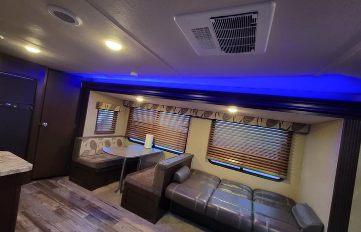 Fold out couch dining room table collapses to provide another bed of almost equal size