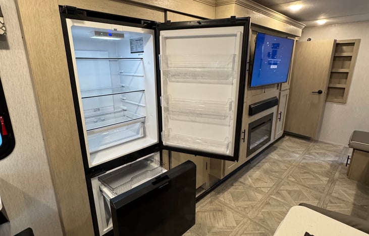 The fridge/freezer is solar powered to maintain a consistent temperature.