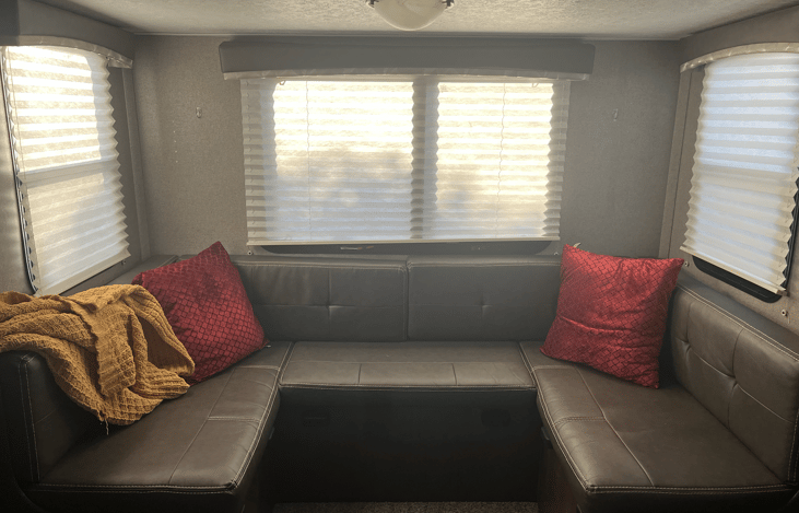 Table can be removed to make a U-shaped seating area.