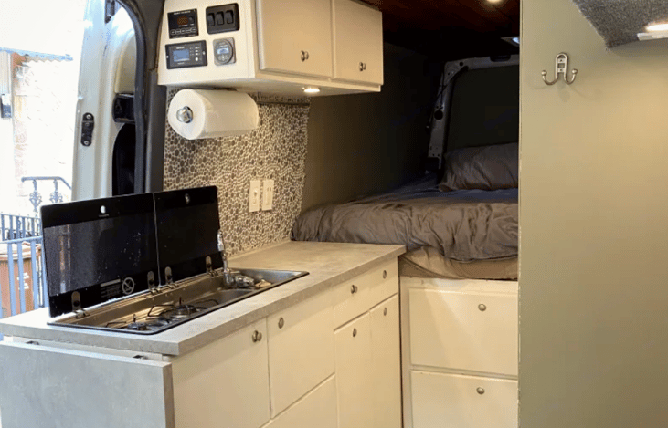 The kitchen includes a stove top, sink, cutlery, all the cooking utensils you will need, it has a ARB chest fridge, as well as cleaning supplies and condiments (oil, pepper/salt, sauces etc)