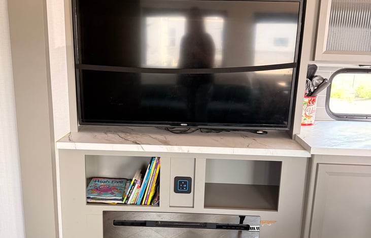 Tv with DVD player and kids books