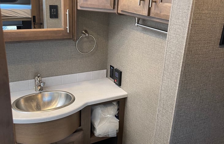 Main bathroom sink and mirror