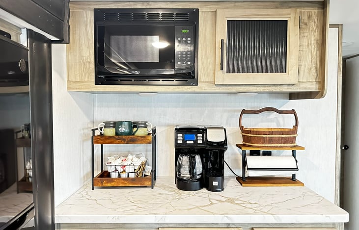 Fabulous coffee bar with keepsake mugs for purchase.  We will have the coffee supplies waiting for you (and some tea).