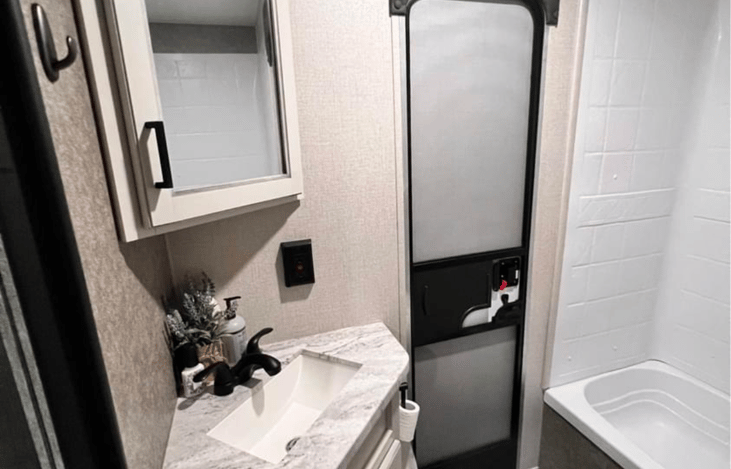 Full bathroom with shower and separate entry