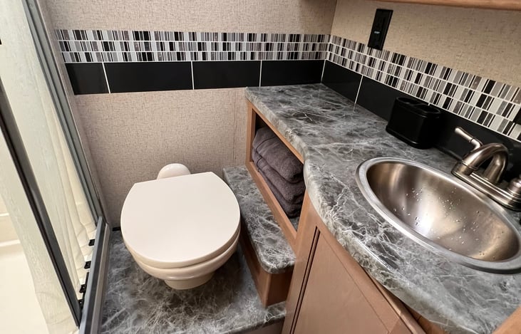 Typical RV bathroom, but there is something "cute" about it!