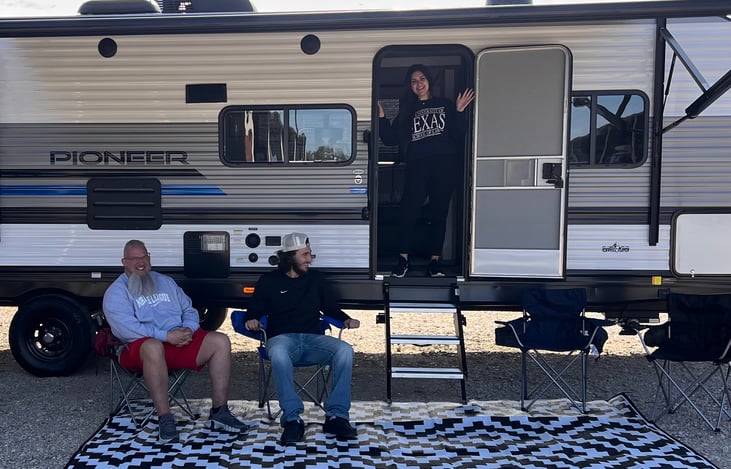 Four chairs and outdoor rug included.