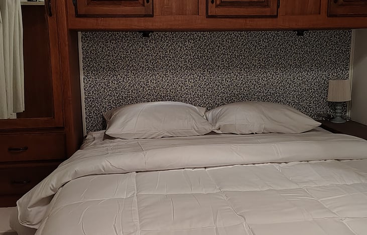 Master bedroom with queen sized bed.