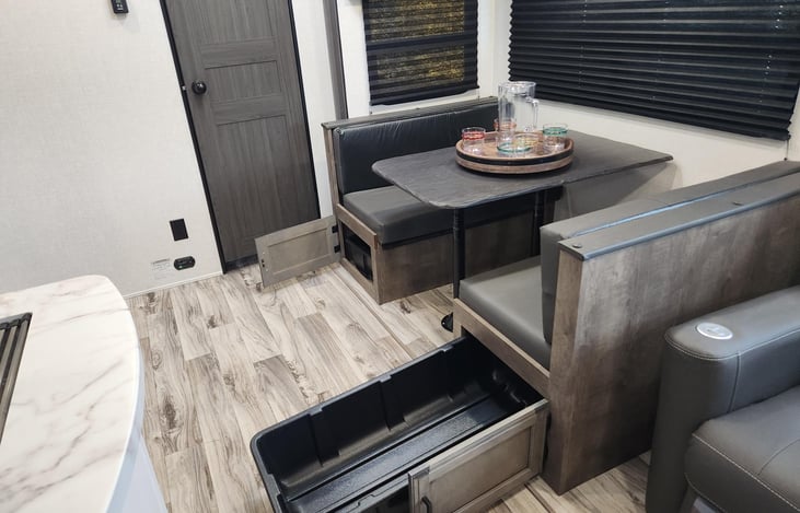 under the dining table storage with containers for easy access