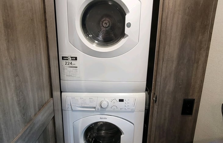 Washer and dryer in bedroom