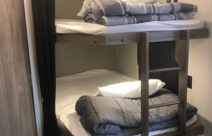 Double sized bunk beds.  All linens and pillows are provided with rental.