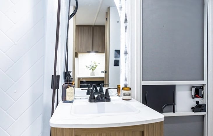 Restroom with shower and its own entrance/exit outdoor access. Tolietries provided at no extra charge.