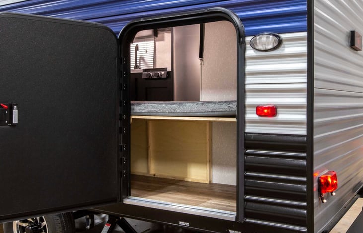More storage under the lower bunk bed that can also be accessed from inside or outside.