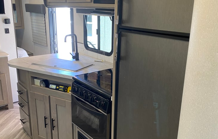 full kitchen with all cookware and utensils