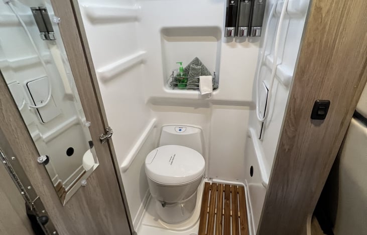Bathroom and shower comes with Shampoo, Conditioner, Soap, Linens, and "RV Toilet Paper."