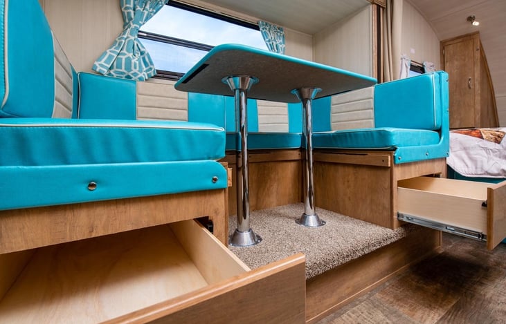 Storage for towels and board games (included).