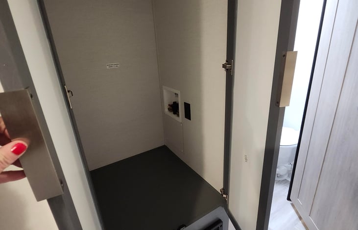 Closet space or a spot for a washer and dryer for those longer rentals.